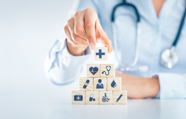 Doctor with building blocks